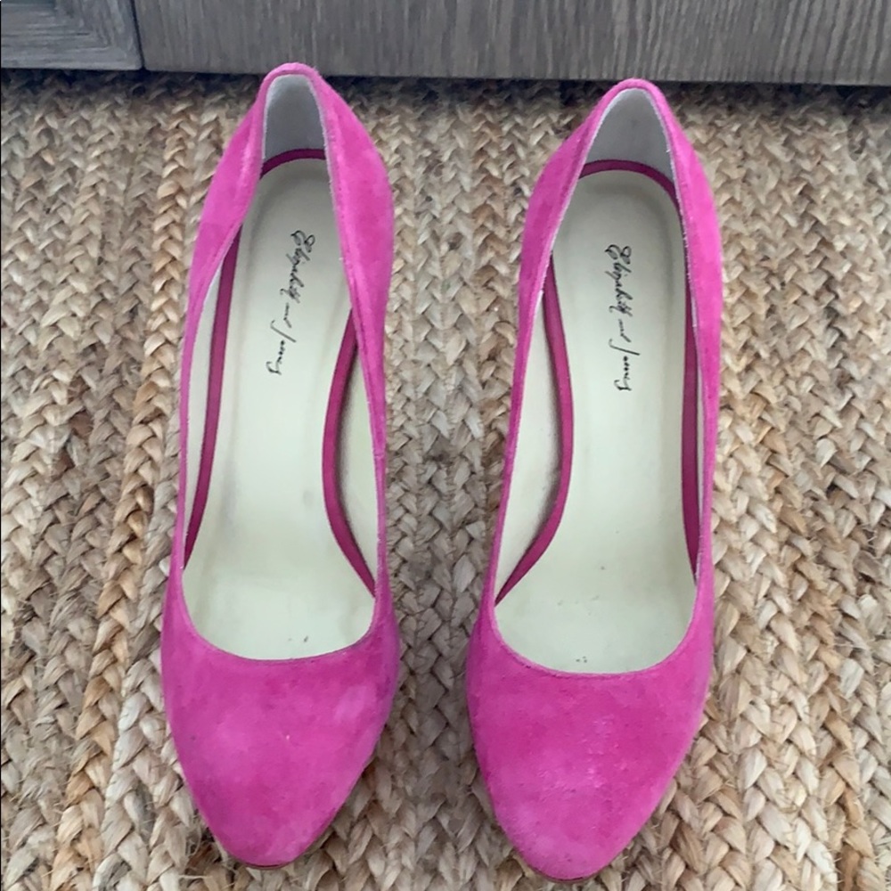 Hot pink suede pumps